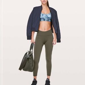 Green size 4 Lululemon running pants with mesh bottom  Train Time olive
